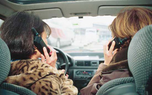 Ladies speaking on their Mobile Phones