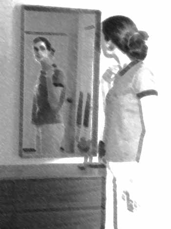Woman looking in the Mirror