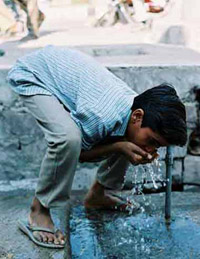 Boy drinking Contaminated Water