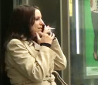 A Lady Smoking Cigarette