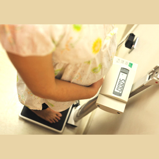 Girl Measuring Weight